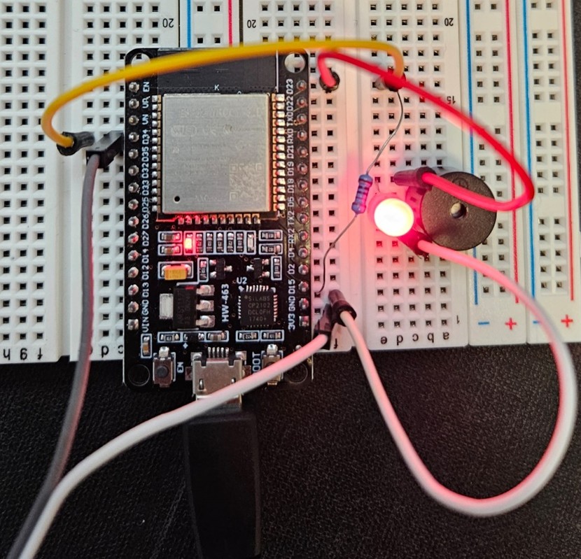 ESP32 circuit with LED indicator and buzzer